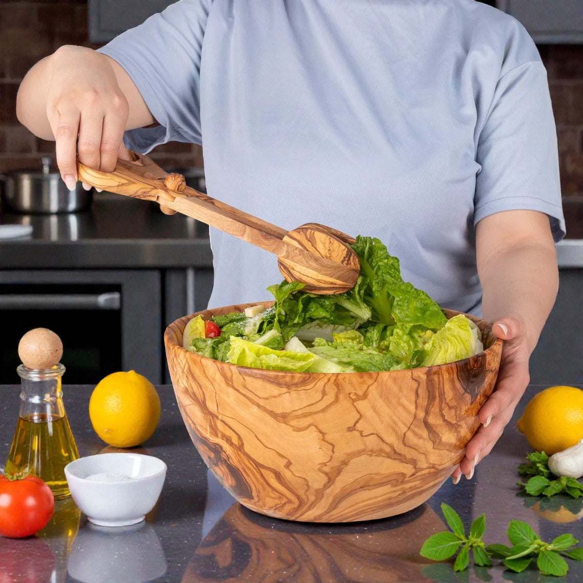 OLIVIKO Olive Wood Bowl handcrafted natural wooden salad bowl with unique grain pattern in kitchen setting
