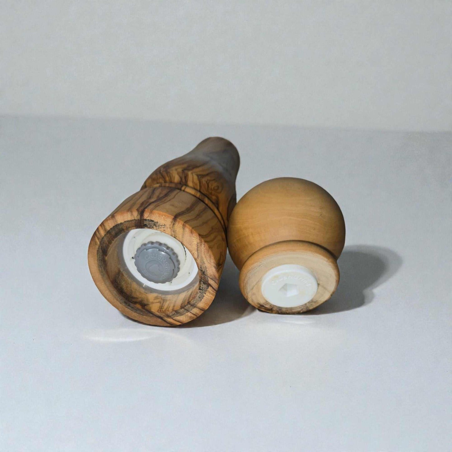 Handcrafted olive wood salt and pepper grinder mills with CrushGrind ceramic mechanisms, 9 inches tall