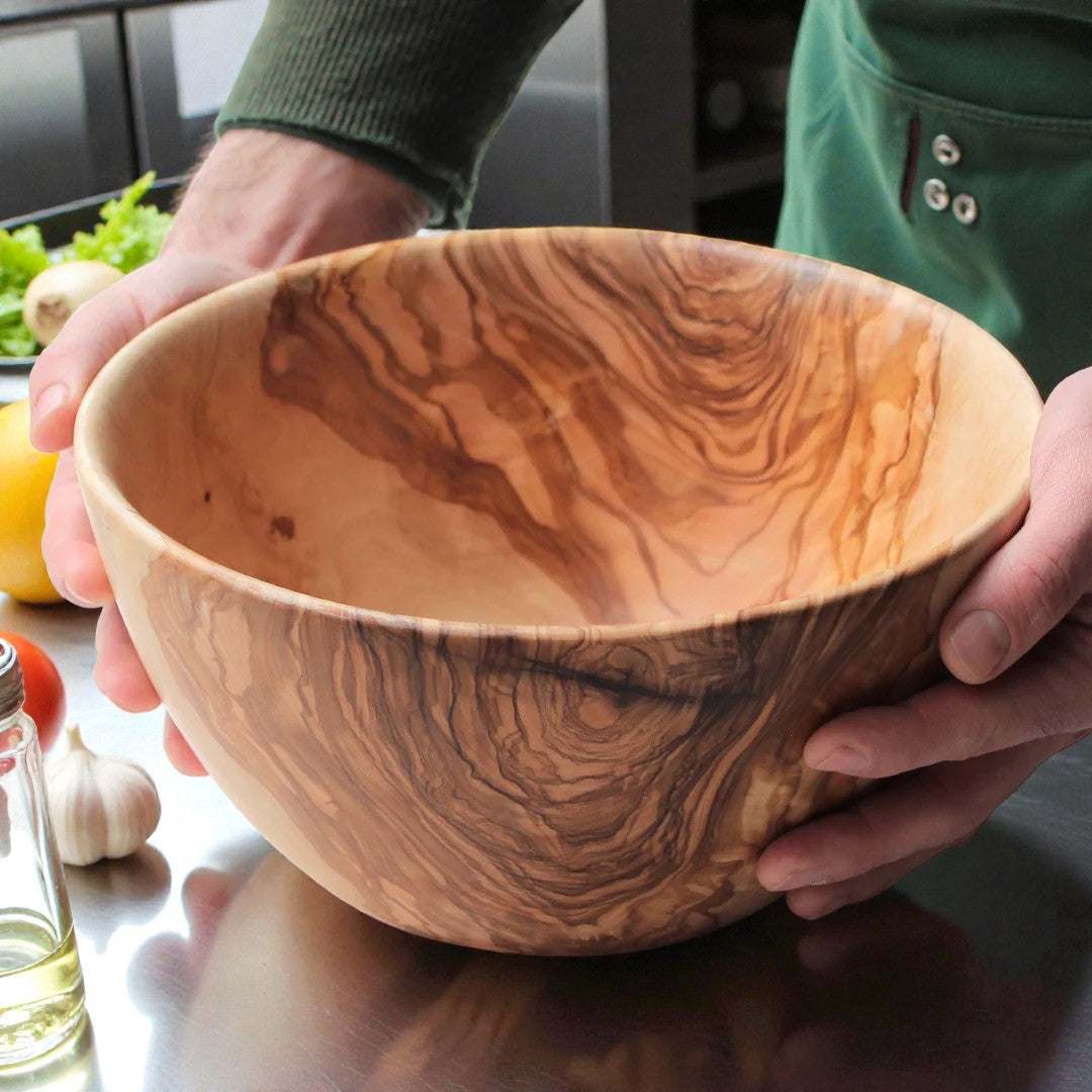 Handcrafted OLIVIKO Olive Wood Bowl with natural grain, perfect for serving salads and snacks