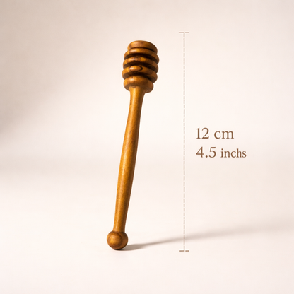 Handcrafted olive wood honey dipper with grooved head for smooth honey drizzle, made from natural, food-safe solid olive wood.