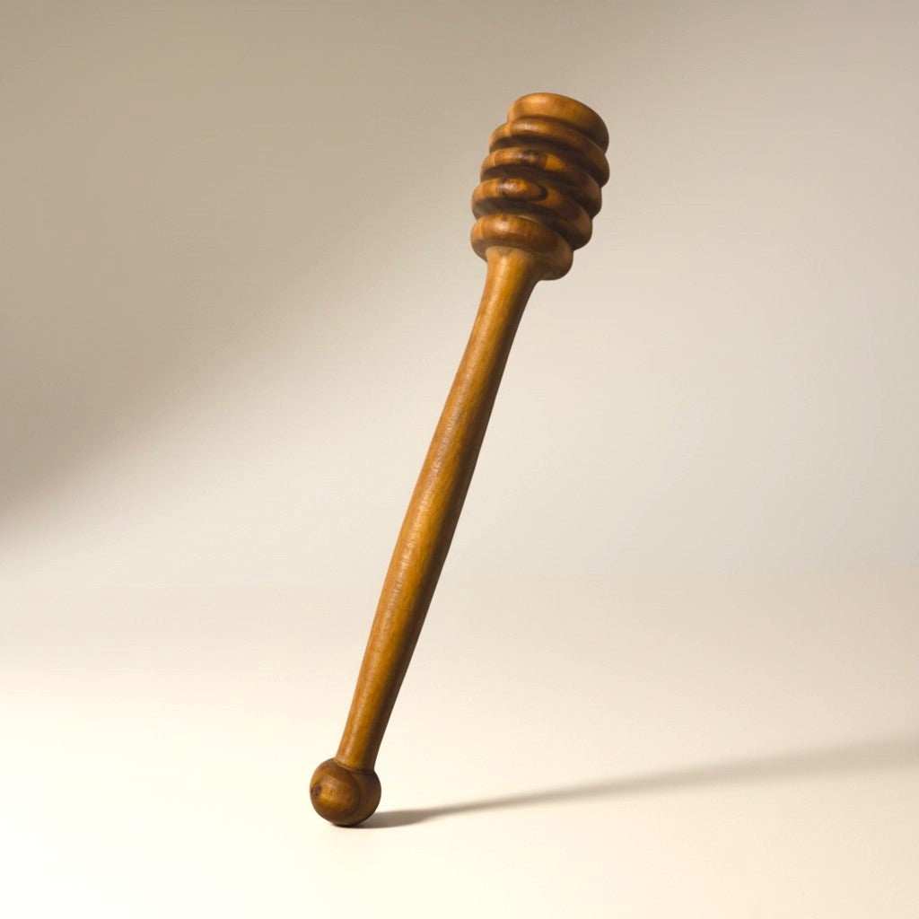 Handcrafted olive wood honey dipper with natural grain for smooth honey drizzling, food-safe and eco-friendly.