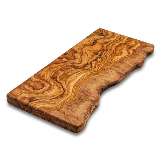 A rustic live-edge wooden serving board with a highly figured grain pattern in warm golden-brown and tan tones, shown on a clean white background.
