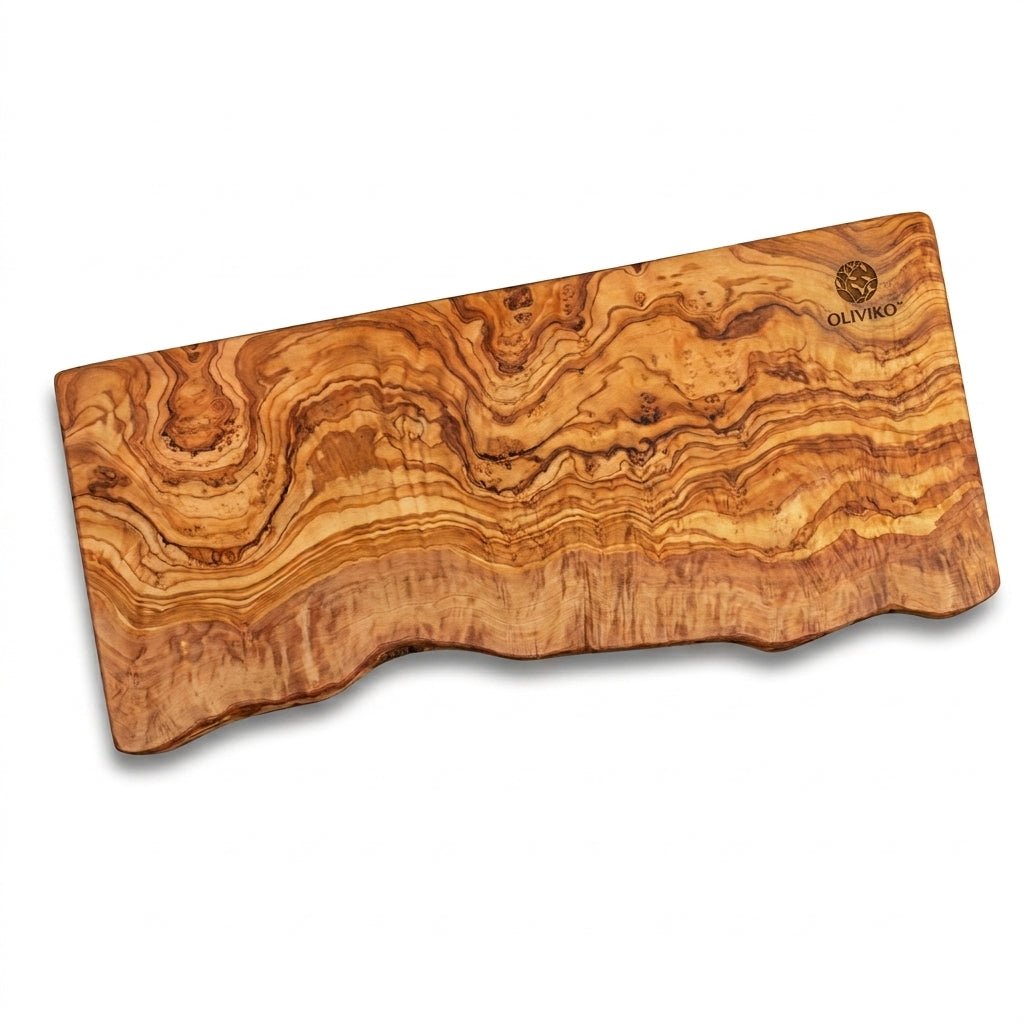 A rectangular olive wood serving board with a natural wavy grain pattern and live edge, featuring the OLIVIKO brand logo in the top right corner, shown on a white background with a soft drop shadow.