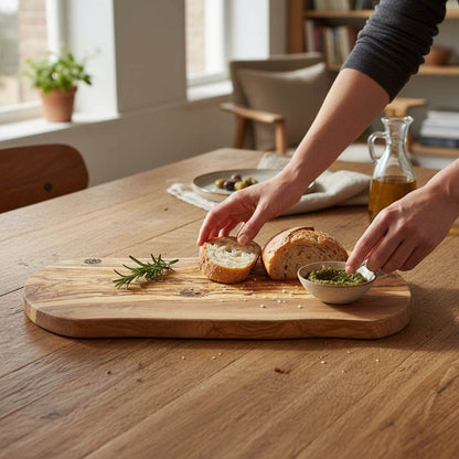 Handmade olive wood cutting board 16x8 inches with natural grain patterns and durable food-safe surface