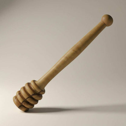 Handcrafted olive wood honey dipper with grooved head for smooth honey drizzling, eco-friendly and food-safe.